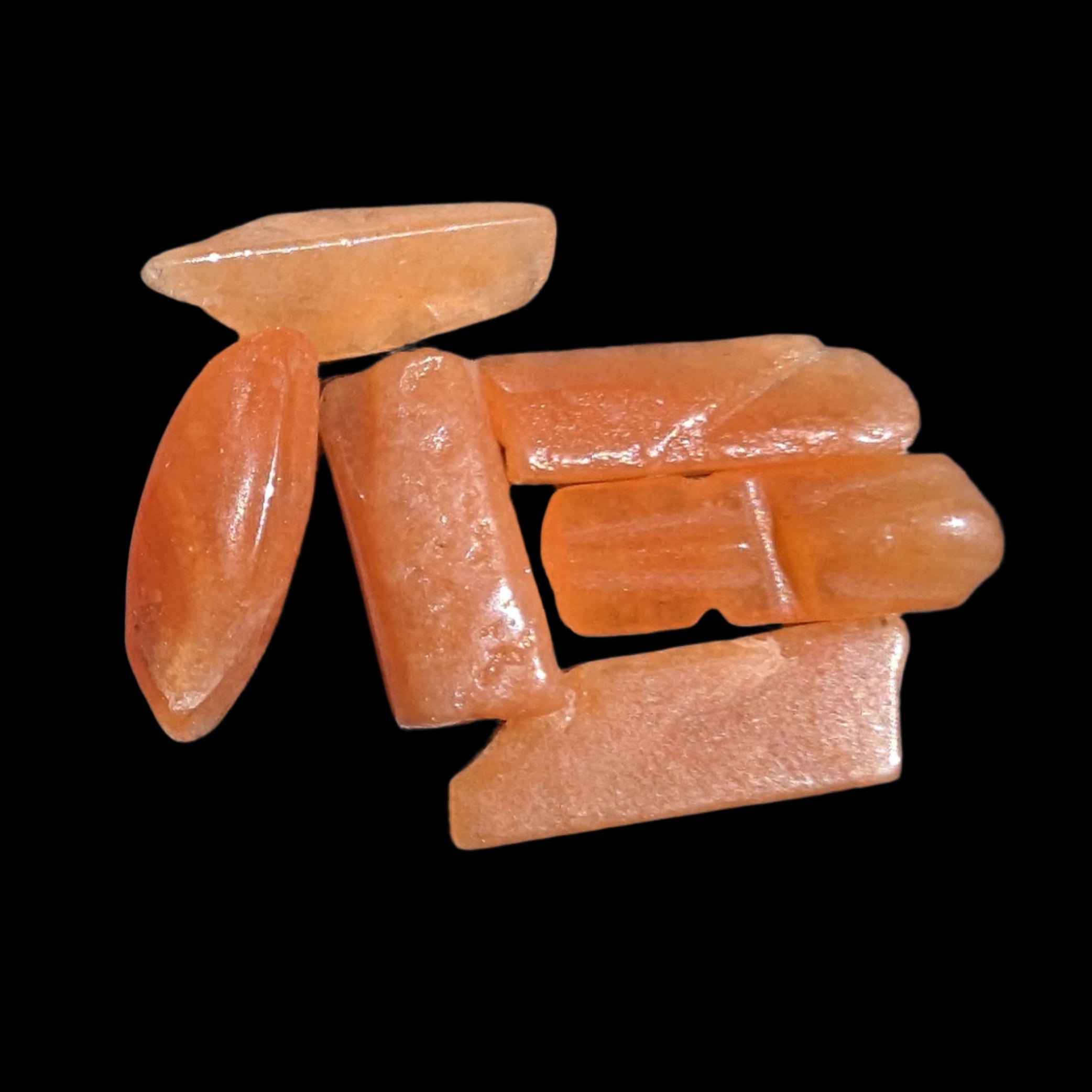 Orange Aventurine 5-7 tiny tumbled stones 5g in sunlight - Rocks and Things Store