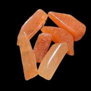 Orange Aventurine 5-7 tiny tumbled stones 5g in sunlight - Rocks and Things Store