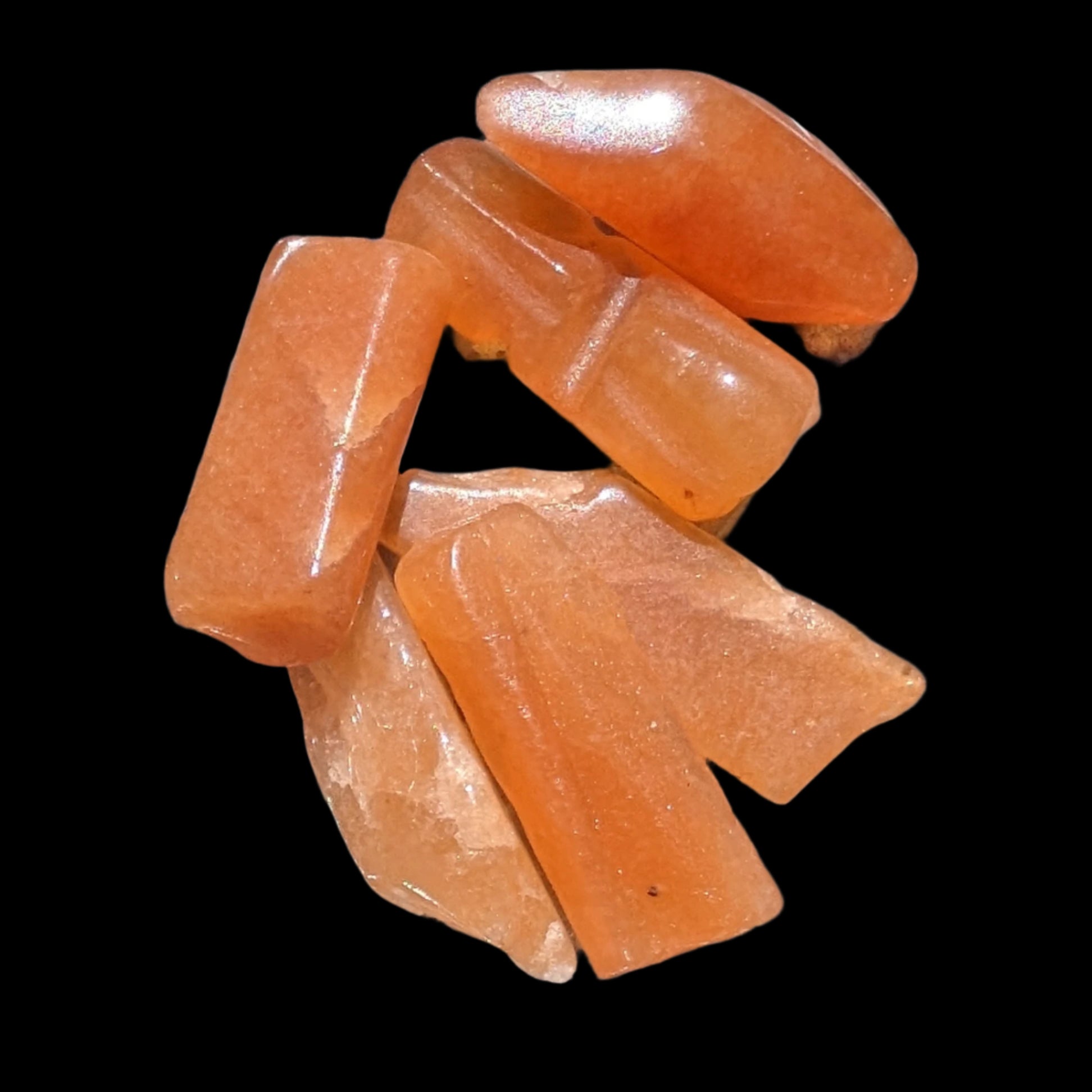 Orange Aventurine 5-7 tiny tumbled stones 5g in sunlight - Rocks and Things Store