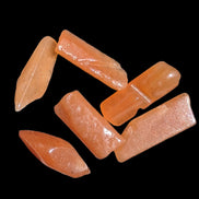 Orange Aventurine 5-7 tiny tumbled stones 5g in sunlight - Rocks and Things Store