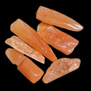 Orange Aventurine 5-7 tiny tumbled stones 5g in sunlight - Rocks and Things Store