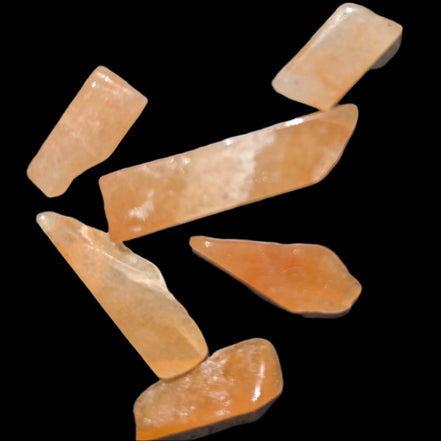Orange Aventurine 5-7 tiny tumbled stones 5g in sunlight - Rocks and Things Store