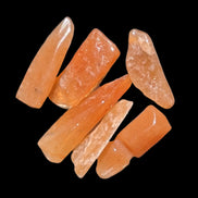 Orange Aventurine 5-7 tiny tumbled stones 5g in sunlight - Rocks and Things Store