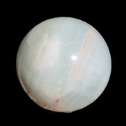 Glorious green Afghan Jade Sphere 347g in sunlight - Rocks and Things Store