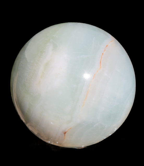 Glorious green Afghan Jade Sphere 347g in sunlight - Rocks and Things Store
