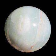 Glorious green Afghan Jade Sphere 347g in sunlight - Rocks and Things Store