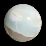 Glorious green Afghan Jade Sphere 347g in sunlight - Rocks and Things Store