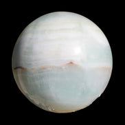 Glorious green Afghan Jade Sphere 347g in sunlight - Rocks and Things Store