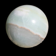 Glorious green Afghan Jade Sphere 347g in sunlight - Rocks and Things Store