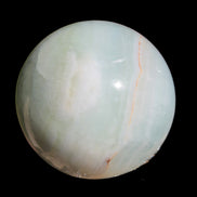 Glorious green Afghan Jade Sphere 347g in sunlight - Rocks and Things Store