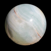 Glorious green Afghan Jade Sphere 347g in sunlight - Rocks and Things Store