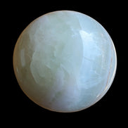 Glorious green Afghan Jade Sphere 347g in sunlight - Rocks and Things Store