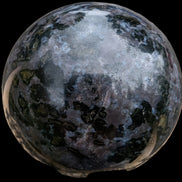 Indigo Gabbro sphere 253g in sunlight - Rocks and Things Store