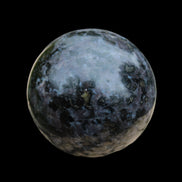 Indigo Gabbro sphere 253g in sunlight - Rocks and Things Store