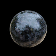 Indigo Gabbro sphere 253g in sunlight - Rocks and Things Store