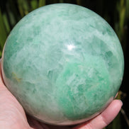 Green Fluorite sphere 3164g in sunlight, Rocks and Things Store