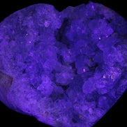Celestite geode 2878g in UV light