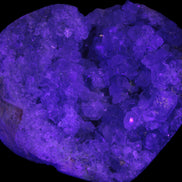 Celestite geode 2878g in UV light