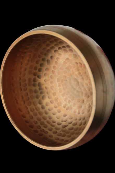 Tibetan hammered Meditation Singing Bowl with mallet and silk mat 100mm 330g in sunlight - Rocks and Things Store