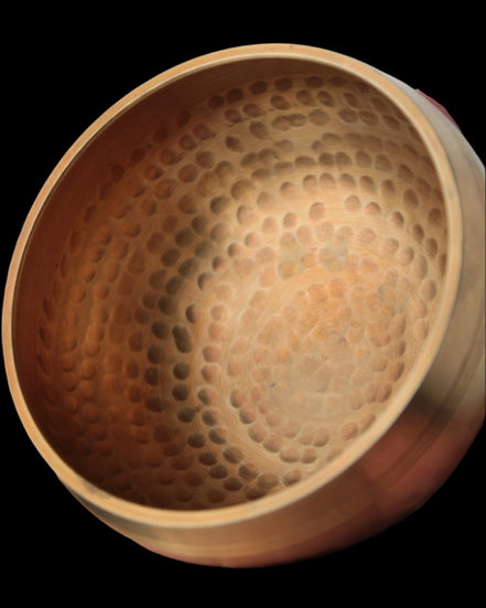 Tibetan hammered Meditation Singing Bowl with mallet and silk mat 100mm 330g in sunlight - Rocks and Things Store