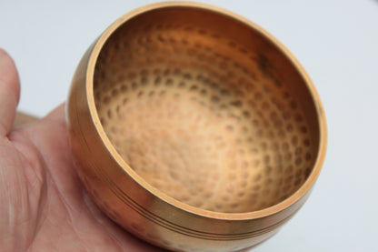 Tibetan hammered Meditation Singing Bowl with mallet and silk mat 100mm 330g Rocks and Things