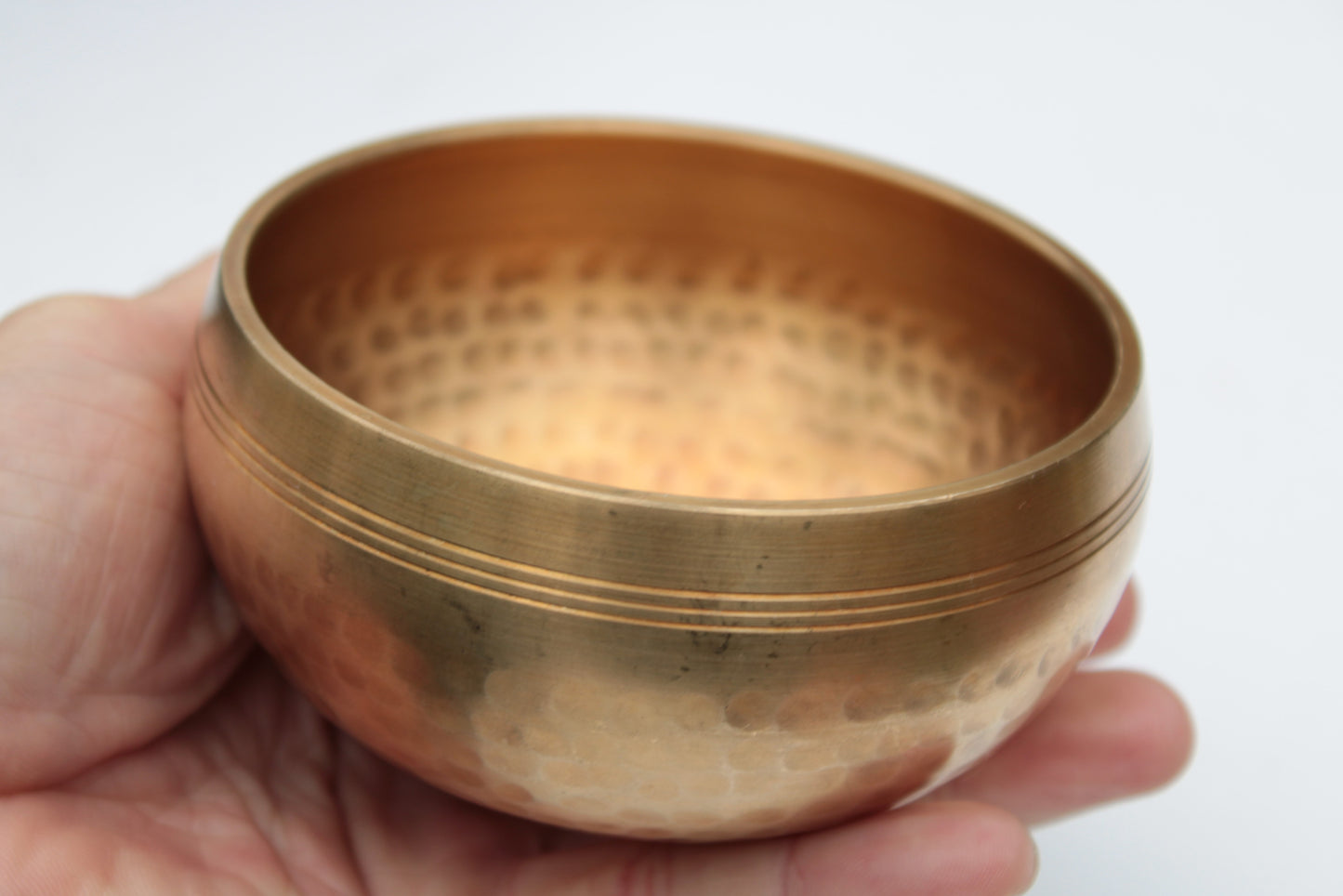 Tibetan hammered Meditation Singing Bowl with mallet and silk mat 100mm 330g Rocks and Things