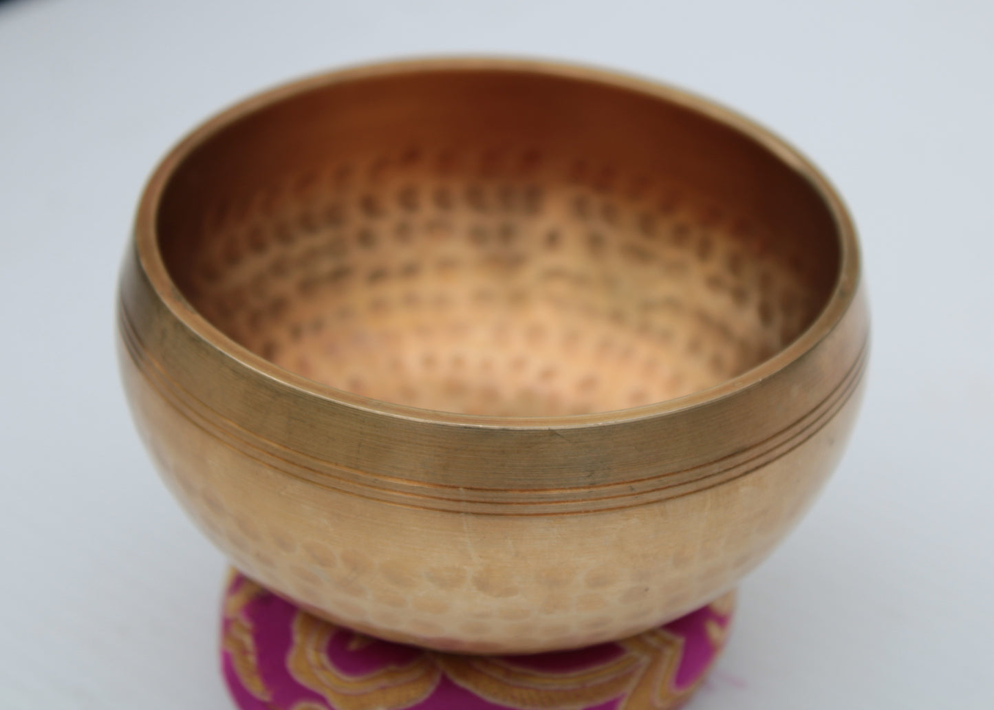 Tibetan hammered Meditation Singing Bowl with mallet and silk mat 100mm 330g Rocks and Things