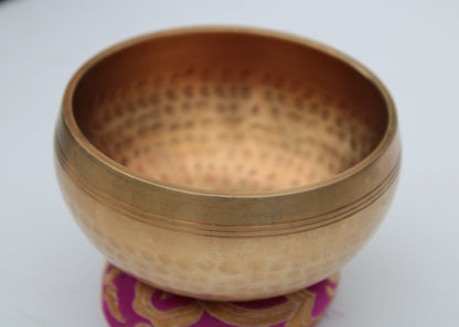 Tibetan hammered Meditation Singing Bowl with mallet and silk mat 100mm 330g Rocks and Things