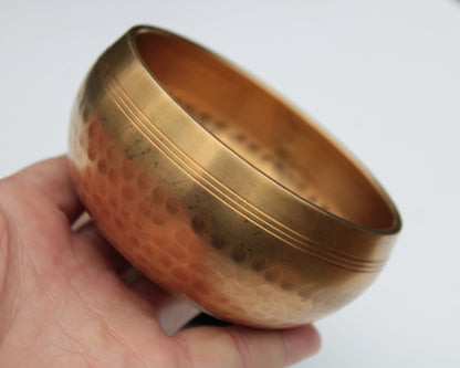 Tibetan hammered Meditation Singing Bowl with mallet and silk mat 100mm 330g Rocks and Things