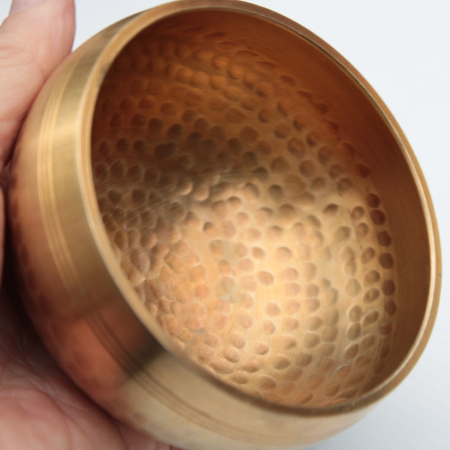 Tibetan hammered Meditation Singing Bowl with mallet and silk mat 100mm 330g Rocks and Things