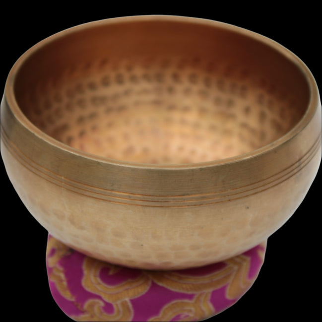 Tibetan hammered Meditation Singing Bowl with mallet and silk mat 100mm 330g in sunlight - Rocks and Things Store