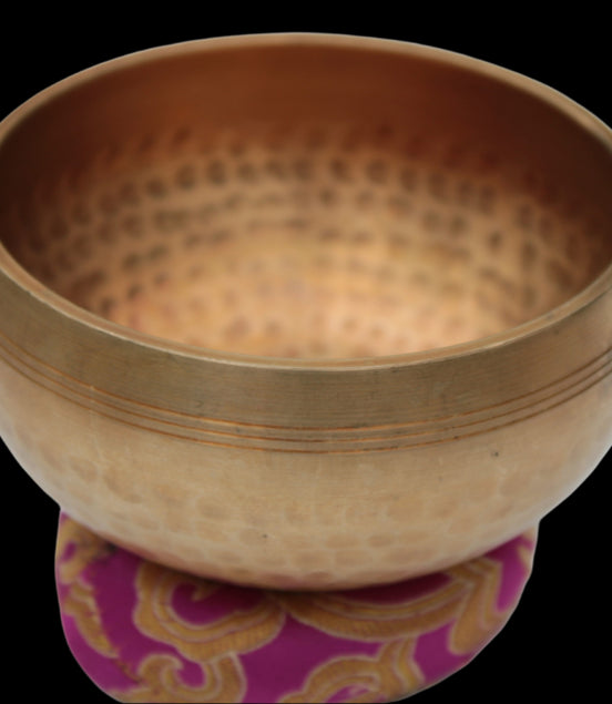 Tibetan hammered Meditation Singing Bowl with mallet and silk mat 100mm 330g in sunlight - Rocks and Things Store