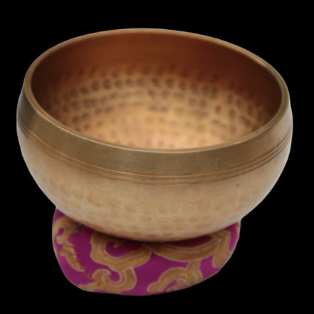 Tibetan hammered Meditation Singing Bowl with mallet and silk mat 100mm 330g in sunlight - Rocks and Things Store