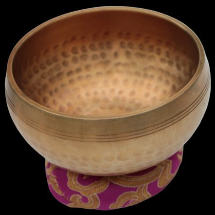 Tibetan hammered Meditation Singing Bowl with mallet and silk mat 100mm 330g in sunlight - Rocks and Things Store