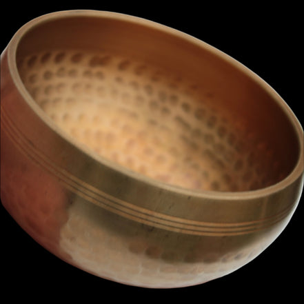 Tibetan hammered Meditation Singing Bowl with mallet and silk mat 100mm 330g in sunlight - Rocks and Things Store