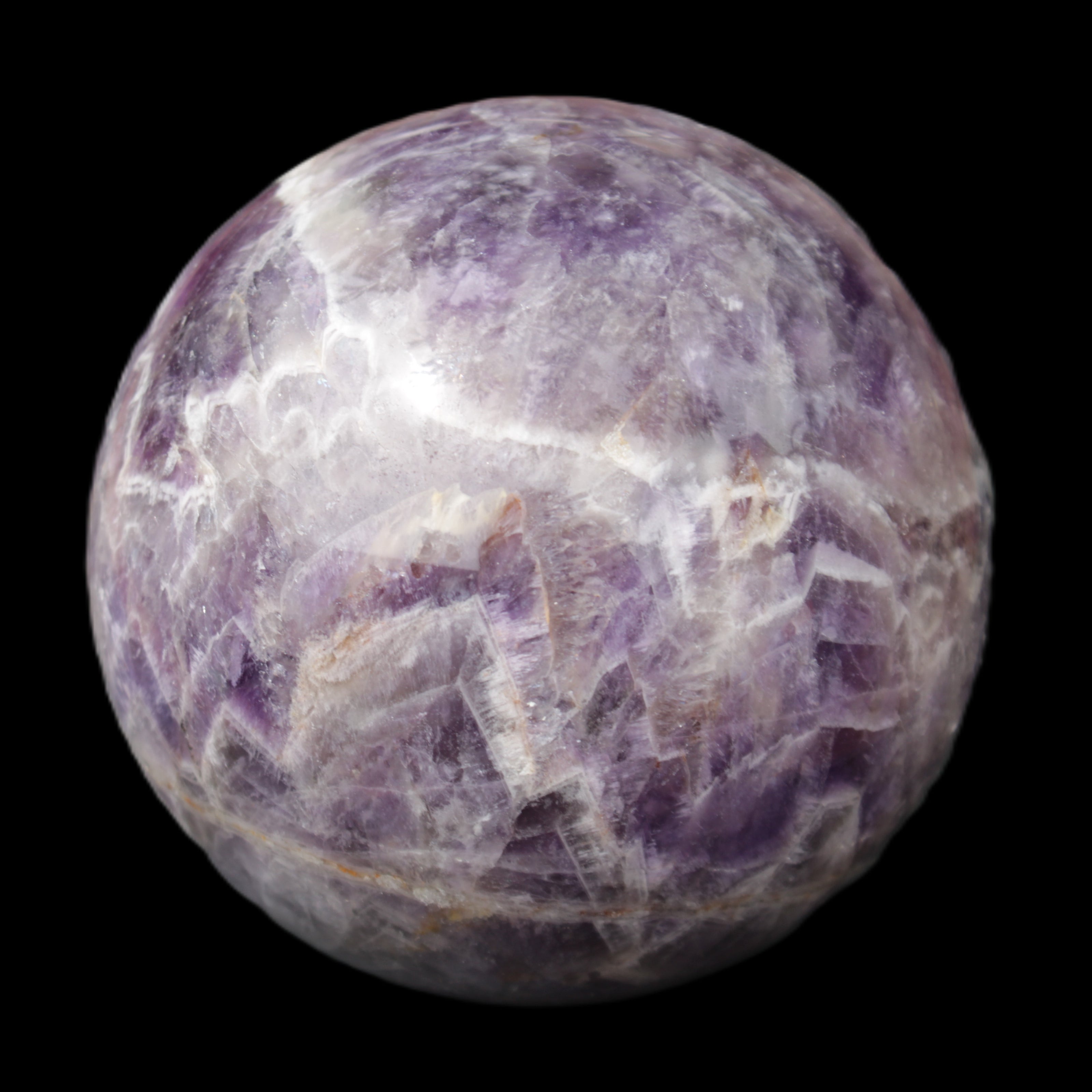 Chevron Fantasy Amethyst sphere 1389g in sunlight - Rocks and Things Store