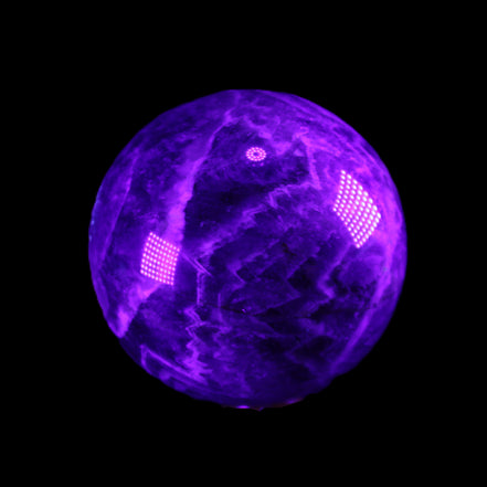 Chevron Fantasy Amethyst sphere 1389g in sunlight - Rocks and Things Store