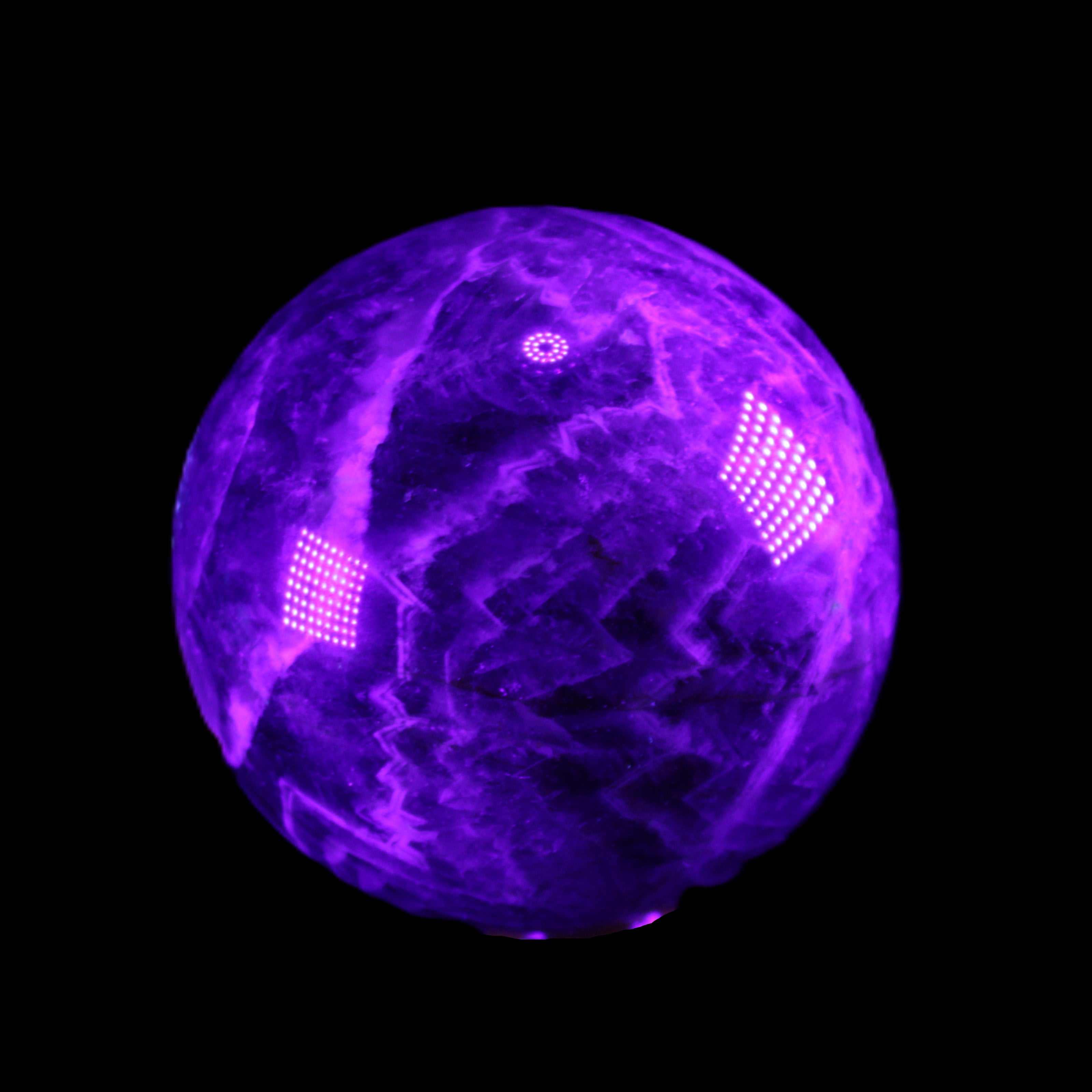 Chevron Fantasy Amethyst sphere 1389g in sunlight - Rocks and Things Store