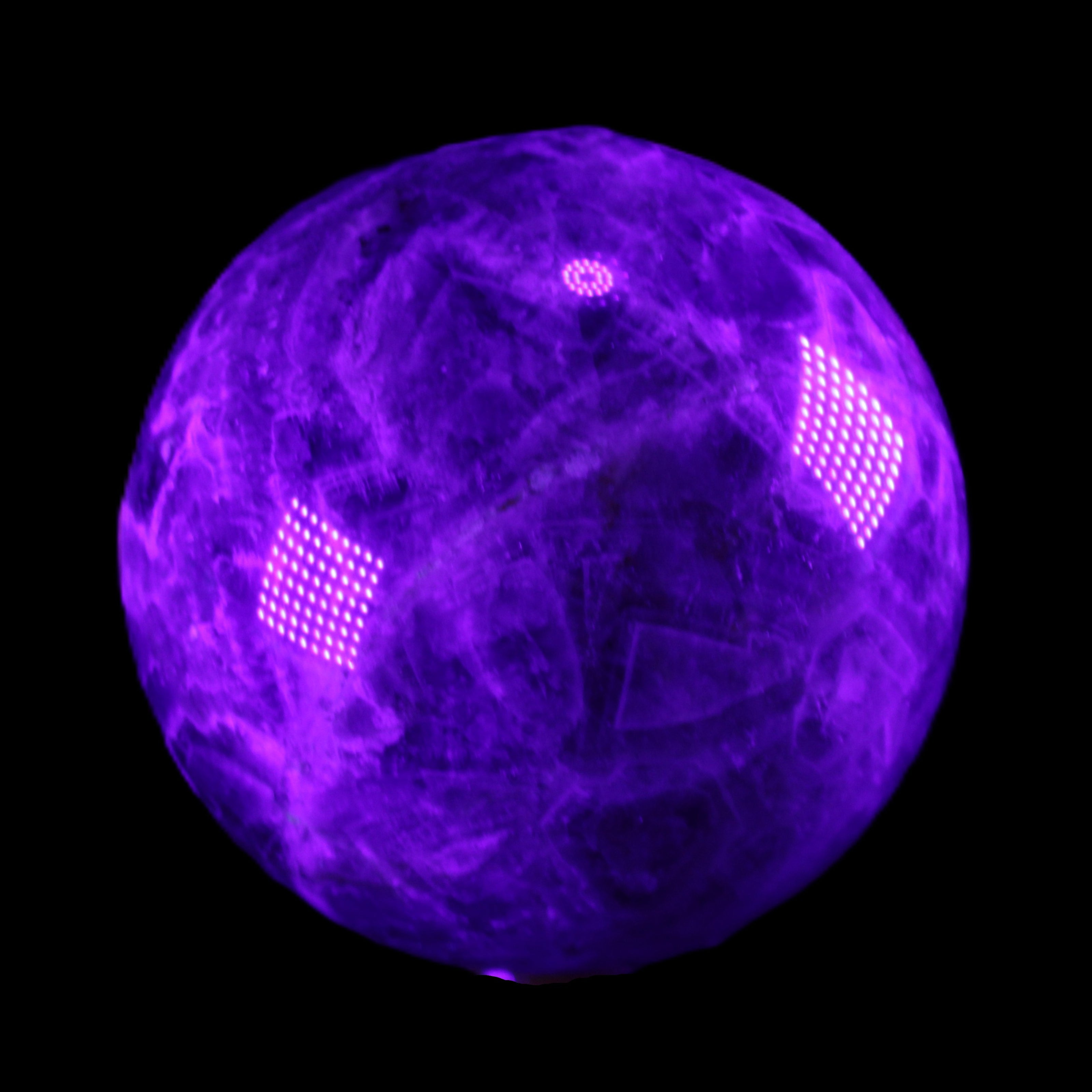 Chevron Fantasy Amethyst sphere 1389g in UV light - Rocks and Things Store