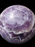 Chevron Fantasy Amethyst sphere 1389g in sunlight - Rocks and Things Store