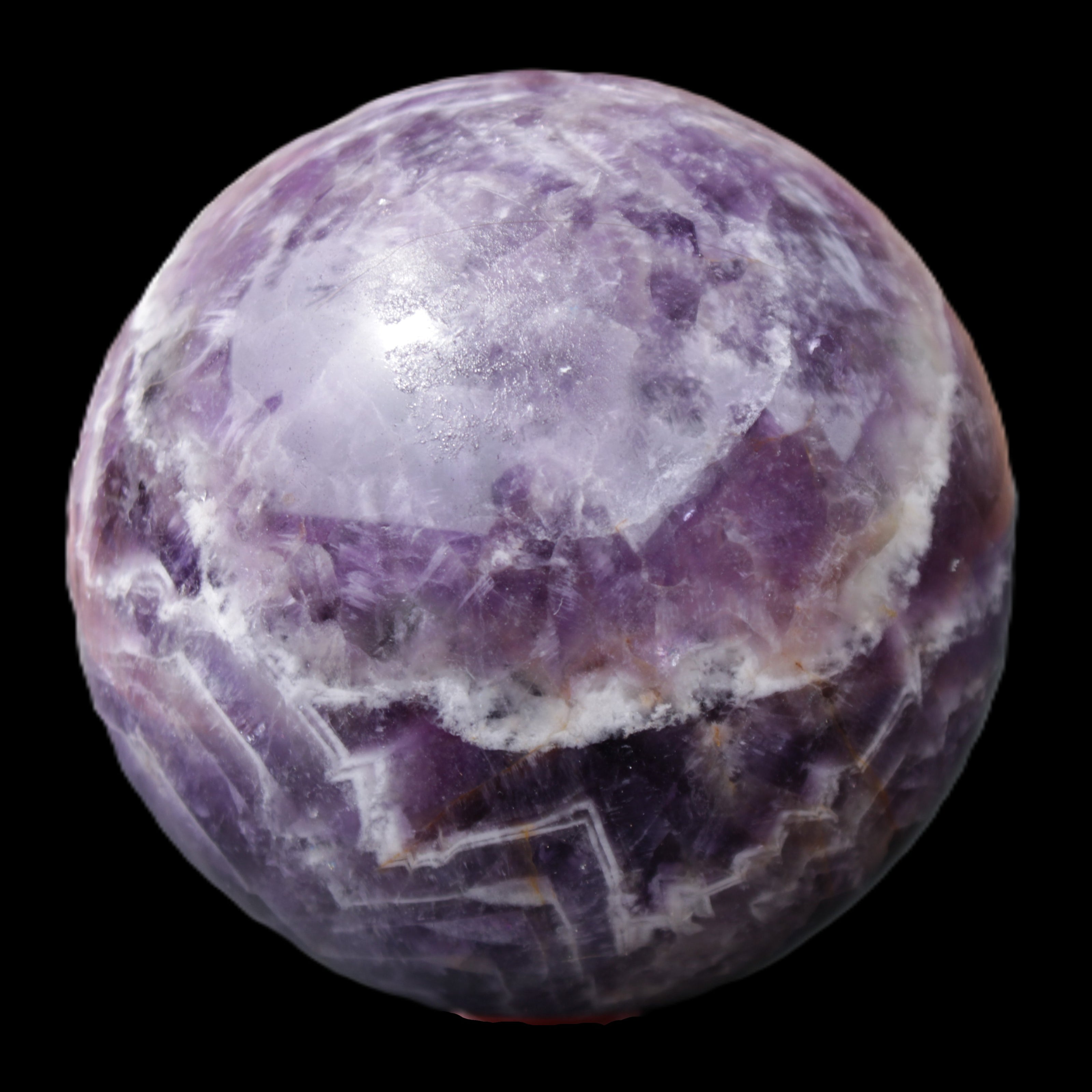 Chevron Fantasy Amethyst sphere 1389g in sunlight - Rocks and Things Store