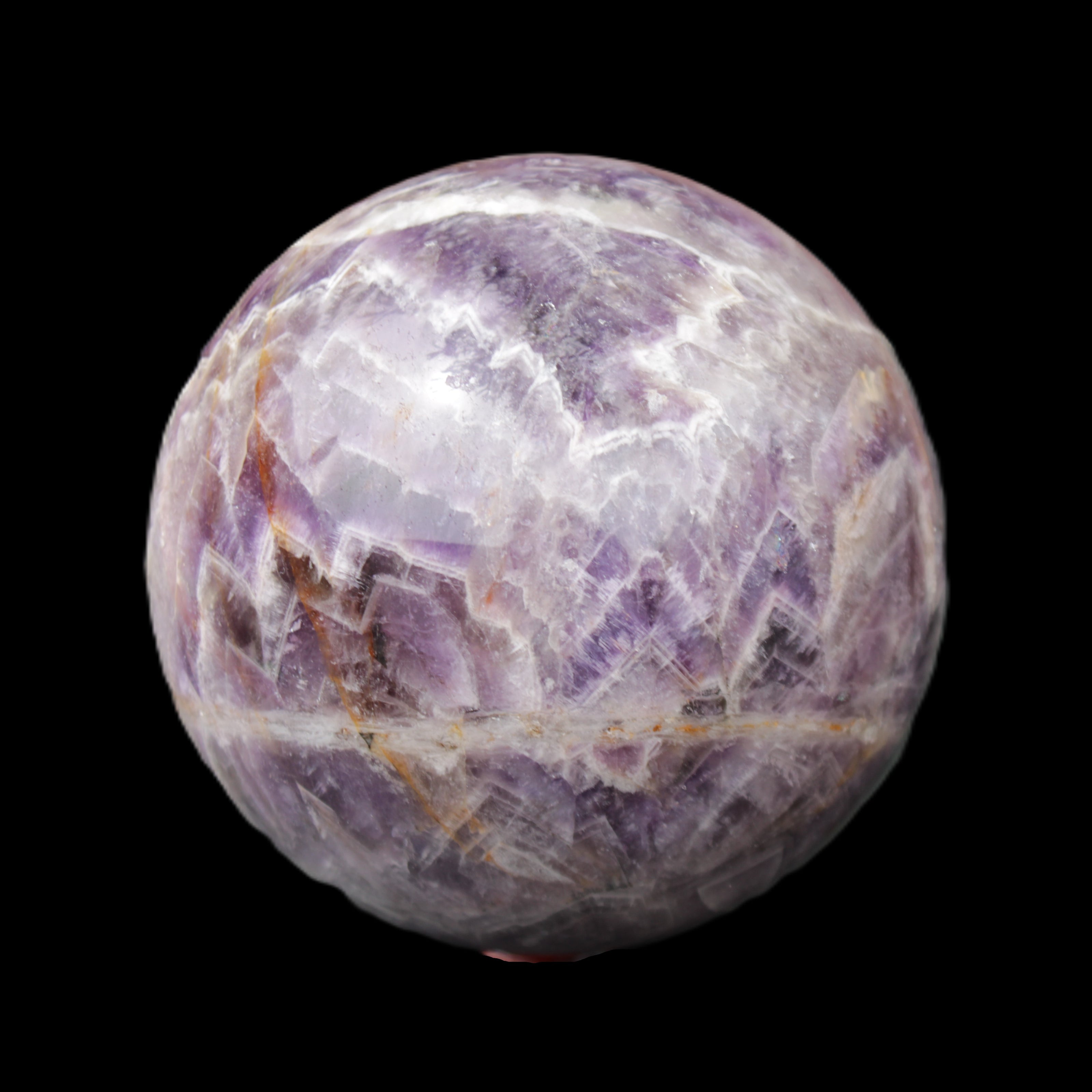 Chevron Fantasy Amethyst sphere 1389g in sunlight - Rocks and Things Store