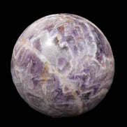 Chevron Fantasy Amethyst sphere 1389g in sunlight - Rocks and Things Store