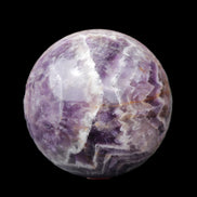 Chevron Fantasy Amethyst sphere 1389g in sunlight - Rocks and Things Store