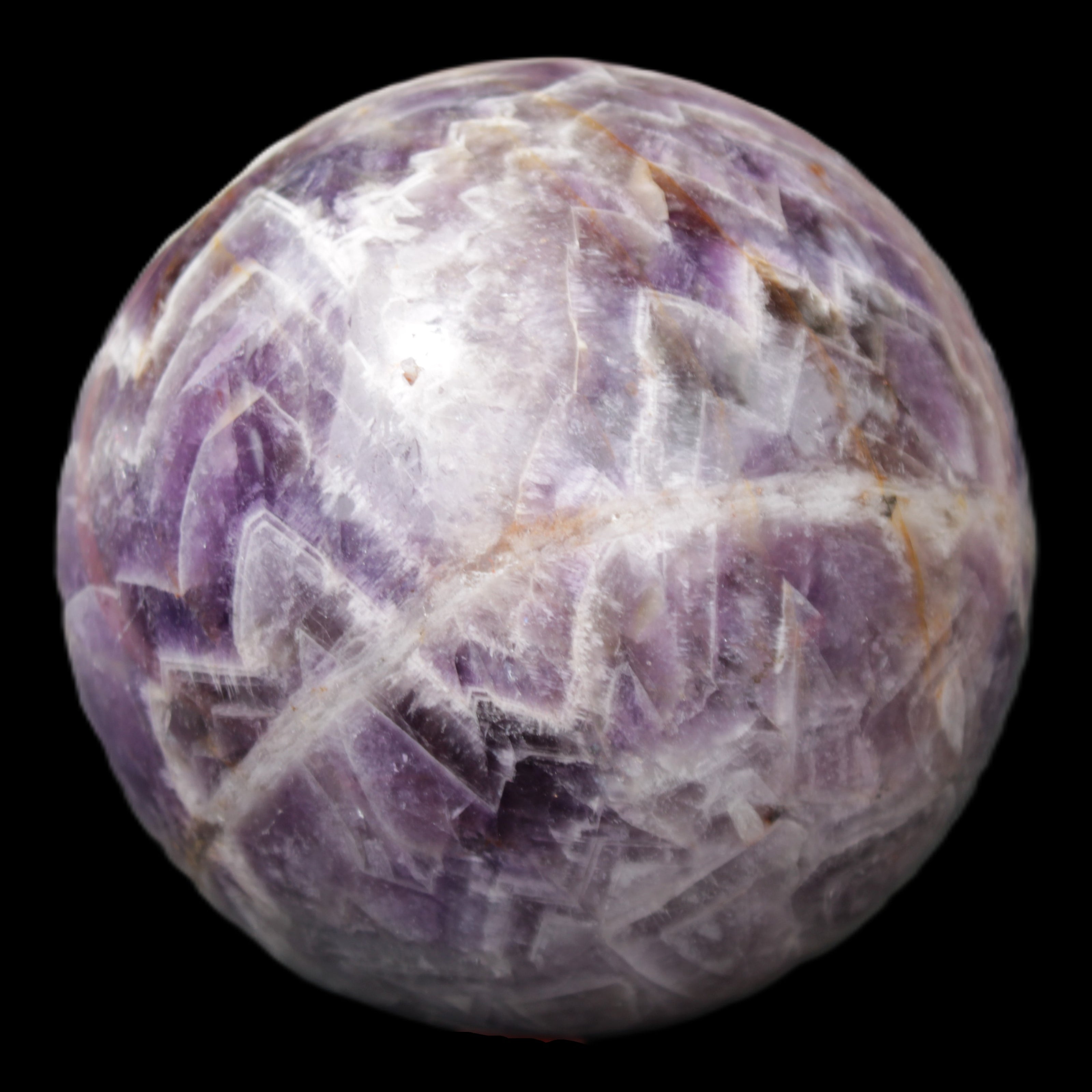Chevron Fantasy Amethyst sphere 1389g in sunlight - Rocks and Things Store