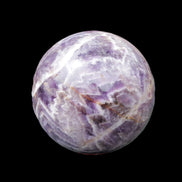 Chevron Fantasy Amethyst sphere 1389g in sunlight - Rocks and Things Store