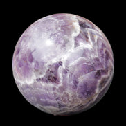 Chevron Fantasy Amethyst sphere 1389g in sunlight - Rocks and Things Store