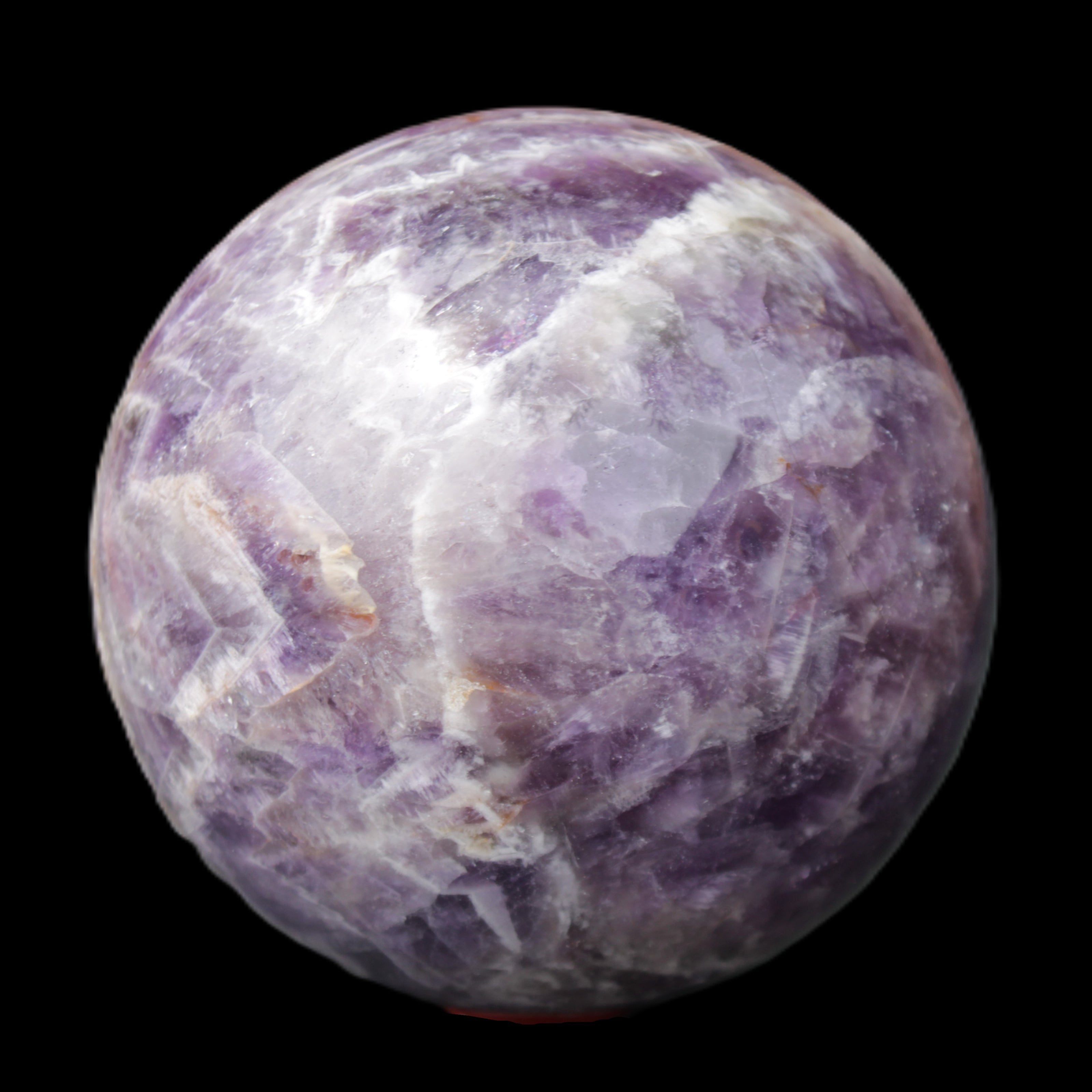 Chevron Fantasy Amethyst sphere 1389g in sunlight - Rocks and Things Store