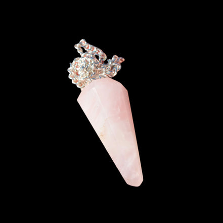 Rose Quartz faceted cone dowsing pendulum 34mm 9g in sunlight - Rocks and Things Store