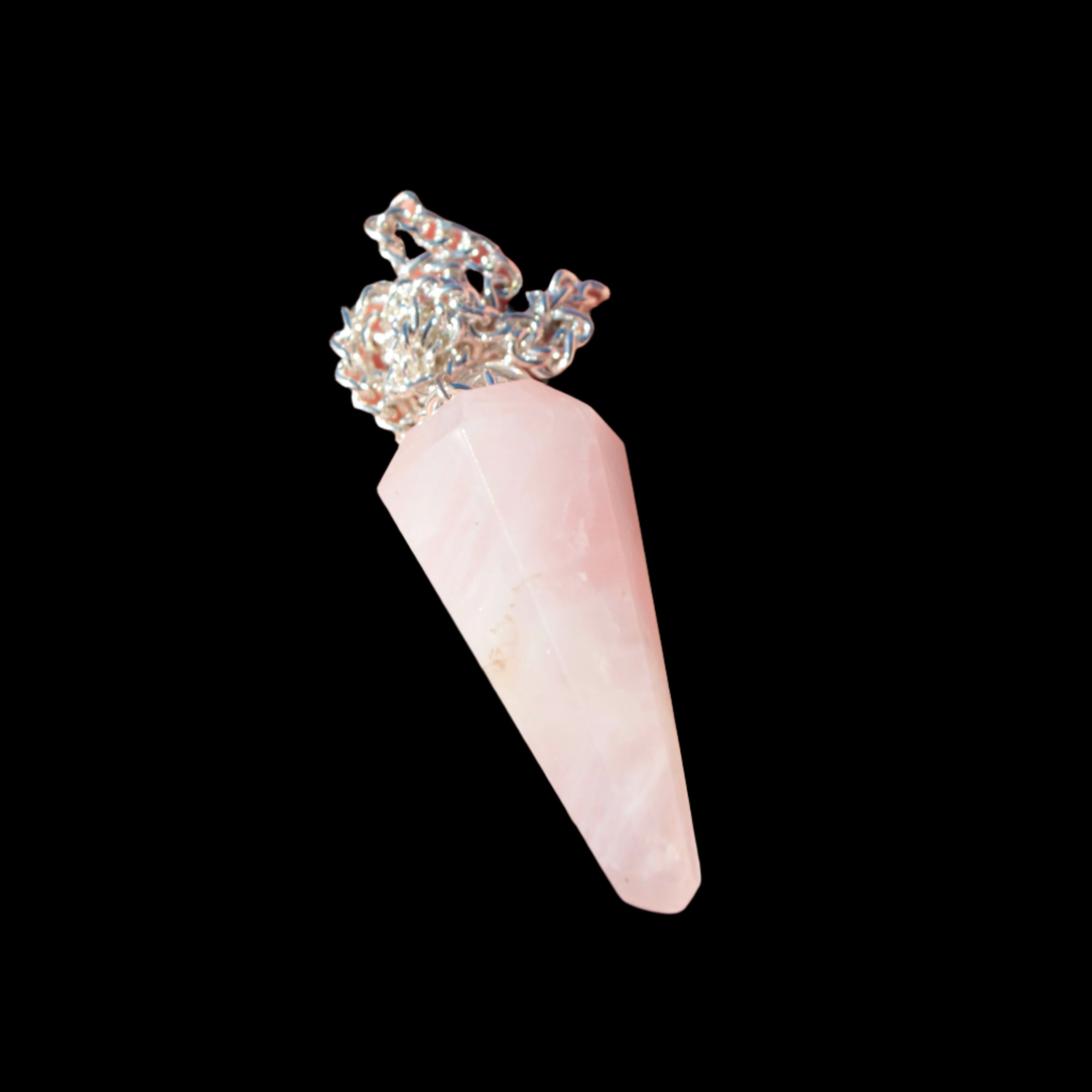 Rose Quartz faceted cone dowsing pendulum 34mm 9g in sunlight - Rocks and Things Store